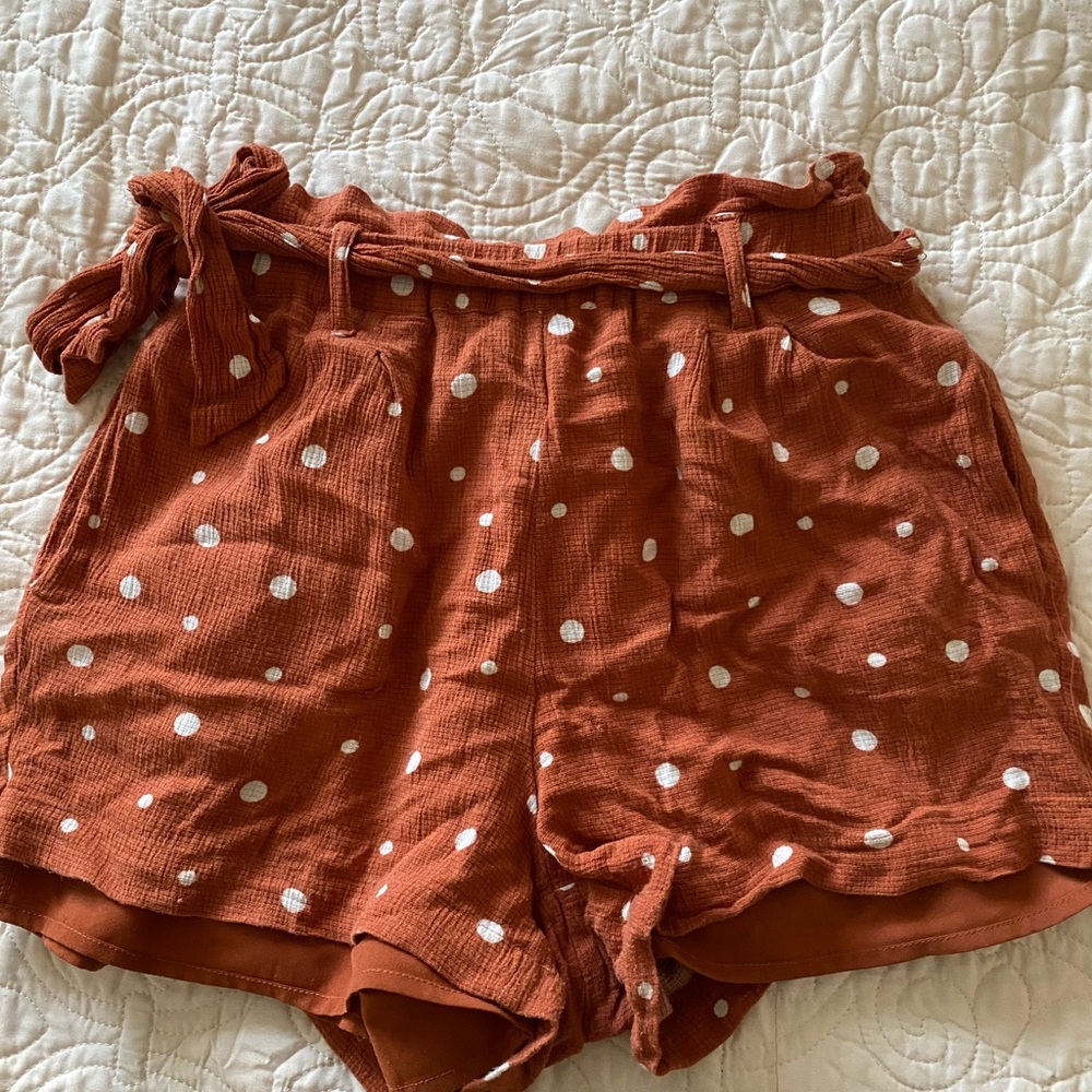 XS burnt orange shorts with white polka dots!